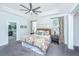 This spacious main bedroom boasts a tray ceiling, fan and ensuite bath at 2234 Mother Of Pearl Dr, Mount Pleasant, SC 29466