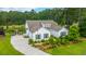 Aerial view of a charming home with well-maintained landscaping and a welcoming driveway; great curb appeal at 225 Camber Rd, Huger, SC 29450