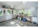Light-filled shed features three windows and utility sink at 225 Camber Rd, Huger, SC 29450