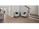 Cozy seating area showcasing modern furniture and hardwood floors at 238 Bird Song Path, Summerville, SC 29485