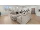Spacious living area showcases an open floor plan leading to the modern kitchen at 238 Bird Song Path, Summerville, SC 29485