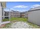 Well-maintained backyard with a storage shed and partial fence at 242 Swallowtail Ln, Goose Creek, SC 29445
