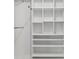 Walk-in closet with bright white custom shelves at 242 Swallowtail Ln, Goose Creek, SC 29445