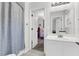 Bright bathroom with a white vanity and view into adjacent bedroom at 2467 Bergeron Way, Mount Pleasant, SC 29466