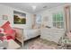 Cozy bedroom with a chandelier, neutral carpet, and furnishings for a young  at 2467 Bergeron Way, Mount Pleasant, SC 29466