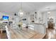 Open dining room flowing from the kitchen, perfect for Gathering gatherings at 2467 Bergeron Way, Mount Pleasant, SC 29466