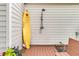 Outdoor shower and surfboard on the side of the home at 2467 Bergeron Way, Mount Pleasant, SC 29466