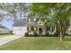 Charming two-story home with a welcoming front porch and well-manicured lawn at 2467 Bergeron Way, Mount Pleasant, SC 29466
