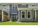 Exterior view of property featuring a shaded patio, green backyard, and privacy fence at 2648 Balena Dr, Mount Pleasant, SC 29466
