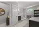 Luxurious bathroom with marble floors, double vanities, soaking tub, and glass enclosed shower at 2648 Balena Dr, Mount Pleasant, SC 29466