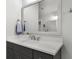 Bright bathroom vanity showcasing a marble countertop, silver faucet, and framed mirror at 2648 Balena Dr, Mount Pleasant, SC 29466