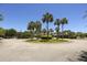 Community clubhouse surrounded by palm trees and featuring circular driveway at 2648 Balena Dr, Mount Pleasant, SC 29466