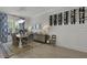 Dining room features a chandelier, wine rack, wood floors, and wainscoting at 2648 Balena Dr, Mount Pleasant, SC 29466