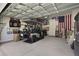 Spacious garage featuring golf cart, wall decorations, and ample room for storage at 2648 Balena Dr, Mount Pleasant, SC 29466