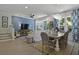 Bright and open living and dining area features stylish decor and wood floors at 2648 Balena Dr, Mount Pleasant, SC 29466