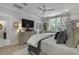 Comfortable main bedroom featuring stylish decor, television, and natural light at 2648 Balena Dr, Mount Pleasant, SC 29466