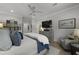 Comfortable main bedroom featuring stylish decor, artwork, and reading chair at 2648 Balena Dr, Mount Pleasant, SC 29466