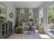 Comfortable sunroom features stylish decor and lots of natural light at 2648 Balena Dr, Mount Pleasant, SC 29466