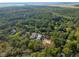 Scenic aerial shot of a beautiful community surrounded by lush green trees and landscaping at 2790 Burden Creek Rd, Johns Island, SC 29455