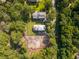 Stunning aerial view of the property with an adjacent lot in a beautiful, wooded neighborhood at 2790 Burden Creek Rd, Johns Island, SC 29455