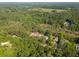 Beautiful aerial of homes nestled amongst a dense forest, offering privacy and nature views at 2790 Burden Creek Rd, Johns Island, SC 29455