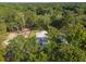 Aerial view showing the property surrounded by mature trees and landscaped grounds at 2790 Burden Creek Rd, Johns Island, SC 29455