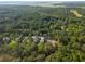 Gorgeous aerial view of the residential area near a lush forest and open green space at 2790 Burden Creek Rd, Johns Island, SC 29455