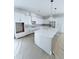 Kitchen with large island, white cabinets, and stainless steel appliances at 2790 Burden Creek Rd, Johns Island, SC 29455