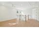 Well-lit upstairs landing with hardwood floors and stylish railings, ideal for versatile use at 2790 Burden Creek Rd, Johns Island, SC 29455