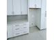 Bright laundry room featuring white cabinets at 2790 Burden Creek Rd, Johns Island, SC 29455