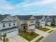 An aerial view showcases the neighborhood, highlighting the neat rows of houses and manicured lawns at 297 Red Leaf Blvd, Moncks Corner, SC 29461