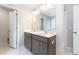 Bathroom with dual sinks, and a large mirror with modern lighting at 297 Red Leaf Blvd, Moncks Corner, SC 29461
