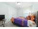 Cozy bedroom featuring a comfortable bed with colorful Clemson-themed bedding and a warm, inviting atmosphere at 297 Red Leaf Blvd, Moncks Corner, SC 29461