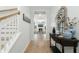 Welcoming entryway with wood floors, white trim, and decorative accents, leading into the spacious living area at 297 Red Leaf Blvd, Moncks Corner, SC 29461