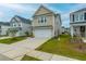 Beautiful two-story home with well-maintained landscaping, driveway, and a welcoming facade at 297 Red Leaf Blvd, Moncks Corner, SC 29461