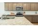 Spacious kitchen with granite counters, stainless appliances, and modern fixtures at 297 Red Leaf Blvd, Moncks Corner, SC 29461