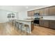 Stylish kitchen featuring stainless steel appliances, a large island, and ample counter space at 297 Red Leaf Blvd, Moncks Corner, SC 29461