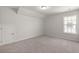 Bedroom featuring neutral carpet, white walls, and one window at 341 Witch Hazel St, Summerville, SC 29486