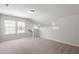 Large bonus room with dormer windows, neutral paint, and carpeting at 341 Witch Hazel St, Summerville, SC 29486