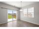 Dining area with sliding glass doors to the backyard and bright windows for natural light at 341 Witch Hazel St, Summerville, SC 29486
