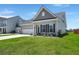 Attractive single-Gathering home with a two-car garage and a green lawn, presenting a welcoming facade at 341 Witch Hazel St, Summerville, SC 29486