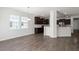 Bright kitchen with dark cabinetry, stainless steel appliances, and plank flooring at 341 Witch Hazel St, Summerville, SC 29486