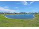 Beautiful lake view with green lawn in front of it at 341 Witch Hazel St, Summerville, SC 29486