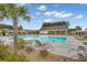 Relaxing community pool featuring lounge chairs and lush landscaping, perfect for outdoor enjoyment at 341 Witch Hazel St, Summerville, SC 29486