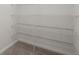 Walk-in closet with carpeted floor and white wire shelving for optimal storage at 341 Witch Hazel St, Summerville, SC 29486