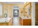 Bathroom with double sink, bathtub and walk in shower and views of the bedroom at 3632 Locklear Ln, Mount Pleasant, SC 29466