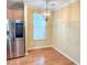 Bright breakfast nook with a modern light fixture and a large window offering plenty of natural light at 3632 Locklear Ln, Mount Pleasant, SC 29466