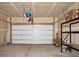 Spacious garage with automatic door opener, shelving and a clean and open floor plan at 3632 Locklear Ln, Mount Pleasant, SC 29466