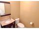 Neatly kept half-bath with a vanity, toilet, and simple decorations at 3632 Locklear Ln, Mount Pleasant, SC 29466