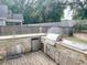 Outdoor kitchen with stone veneer, stainless steel appliances and storage, great for backyard entertaining at 3632 Locklear Ln, Mount Pleasant, SC 29466